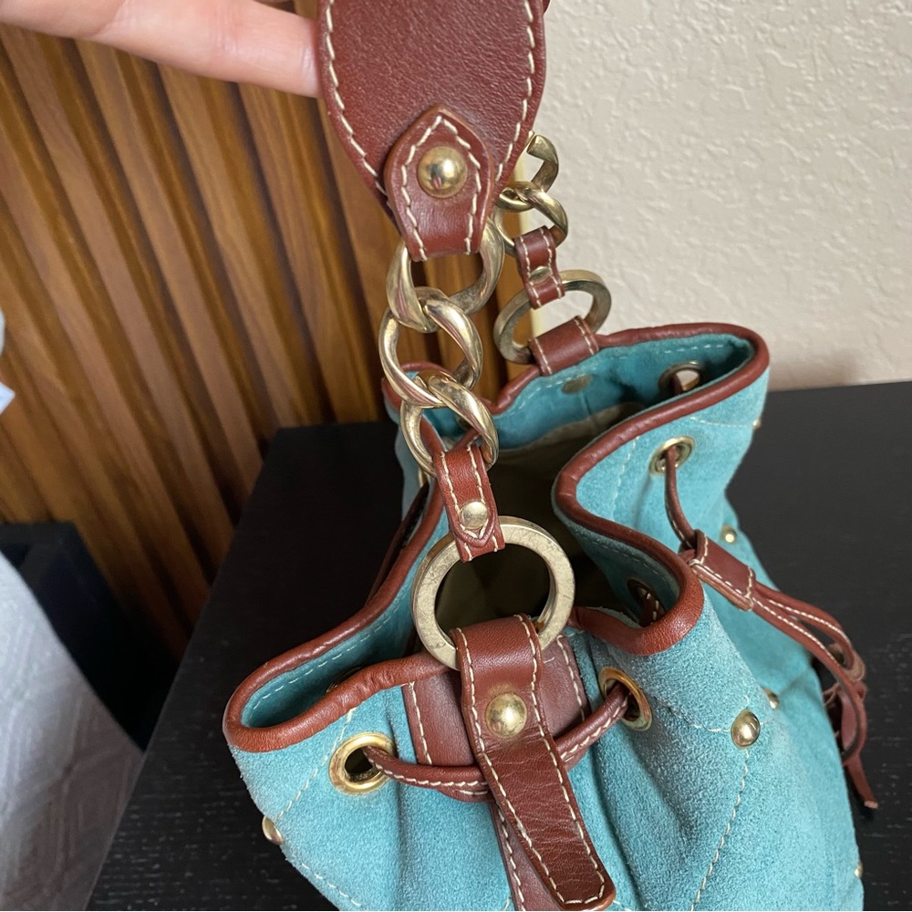 Claudia Firenze Quilted Drawstring
Nubuck Leather Handbag Studded
Bucket Bag - Picture 14 of 16
